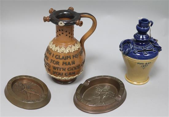 Doulton stoneware money box vase and motto vase and two Johnie Walker copper ashtrays
